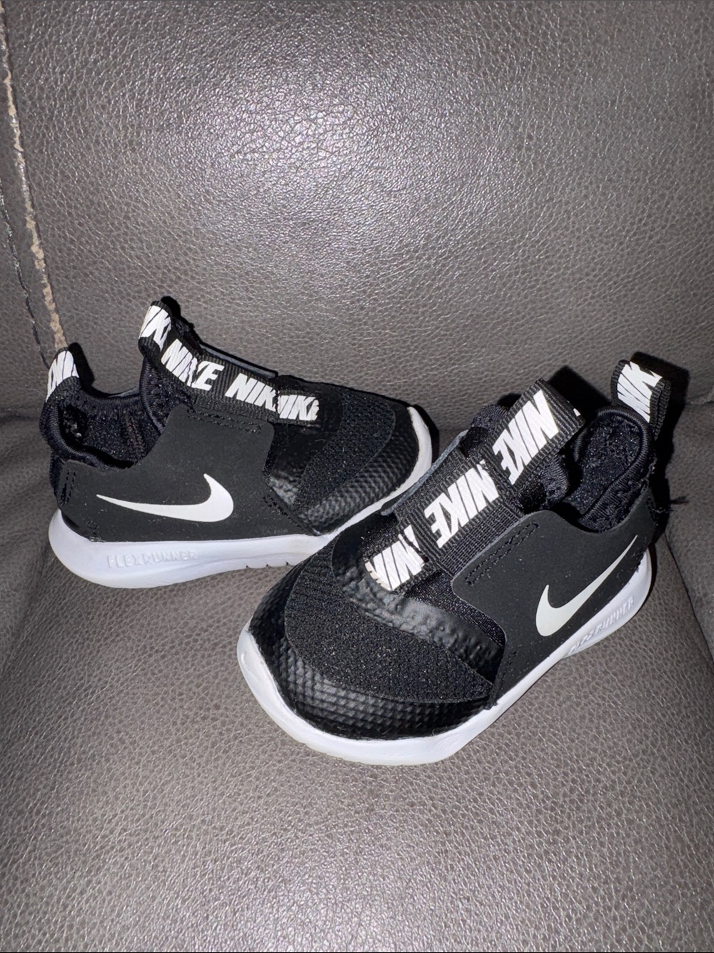Nike Kids Black and White Logo Strap Slip-On Sneakers